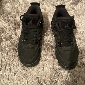 Black slightly worn Jordans